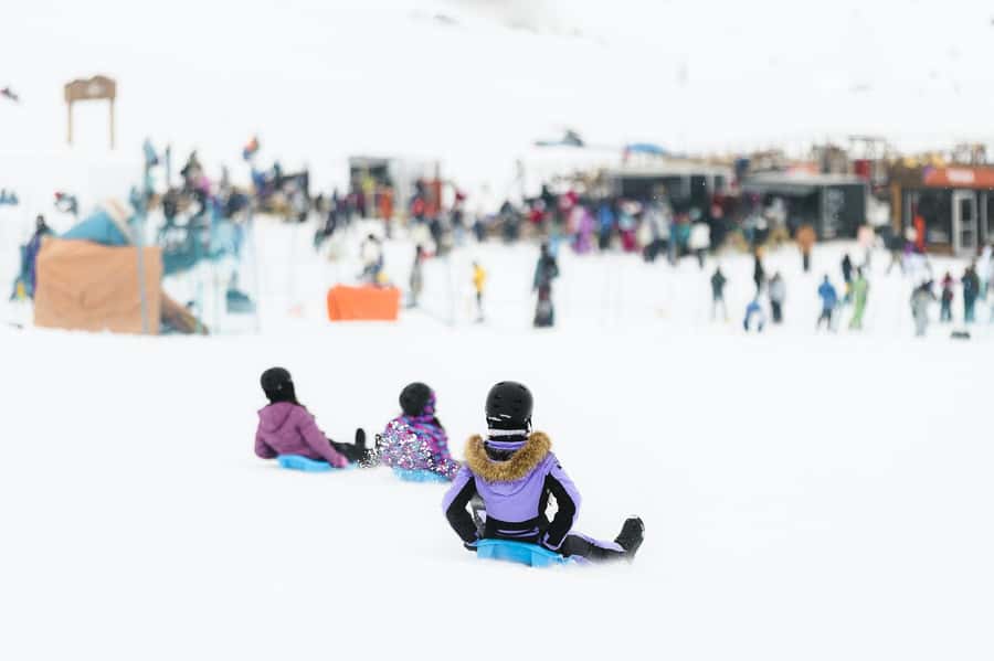 Farellones Park Tour: Snow Adventures - Tubing, Canopy, Chairlift, and Tray Sled