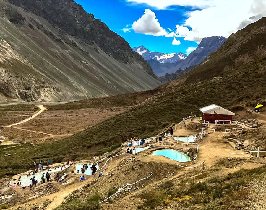 From Santiago: Maipo Canyon Volcano and Hot Spring Tour - A picnic beside the mountain water