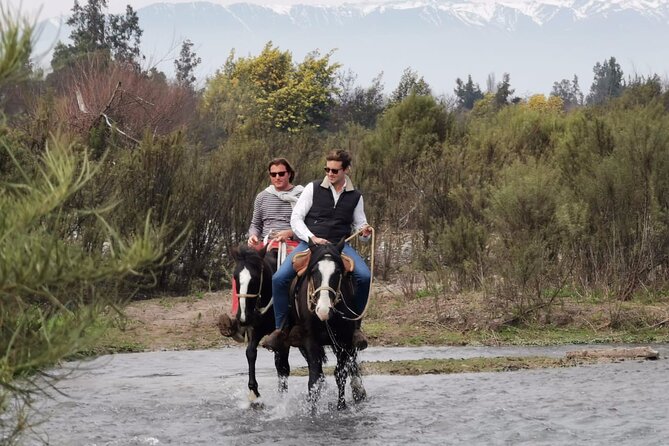 Horseback Private Wine Tour and Country Grill from Santiago - Riding beside vineyards and the Maipo River